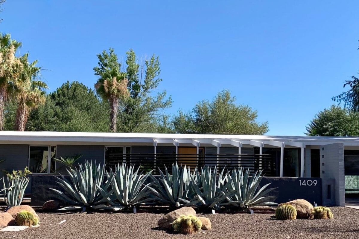 Ralph Haver mid-century modern home in Starlite Vista Phoenix with agave landscaping, low roofline, patio port, block wall, and desert landscaping.