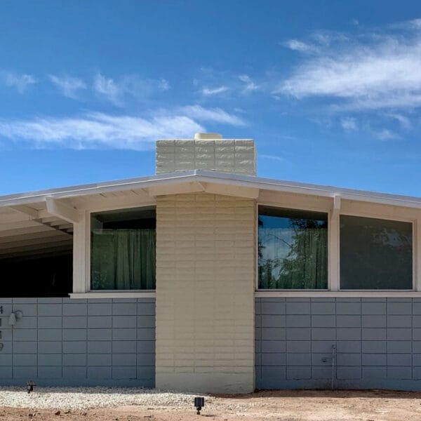 Ralph Haver mid-century modern home in Town and Country Manor Phoenix with block chimney, low roofline, clerestory windows, block wall, and shaded entry.